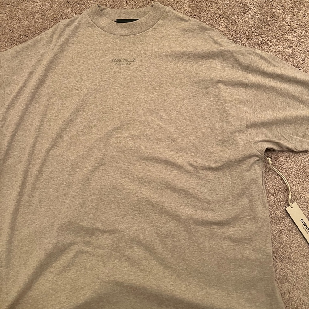 FEAR OF GOD ESSENTIALS
ESSENTIAL TEE - CORE HEATHER